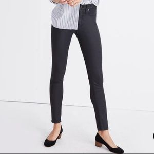 Madewell black coated skinny jeans